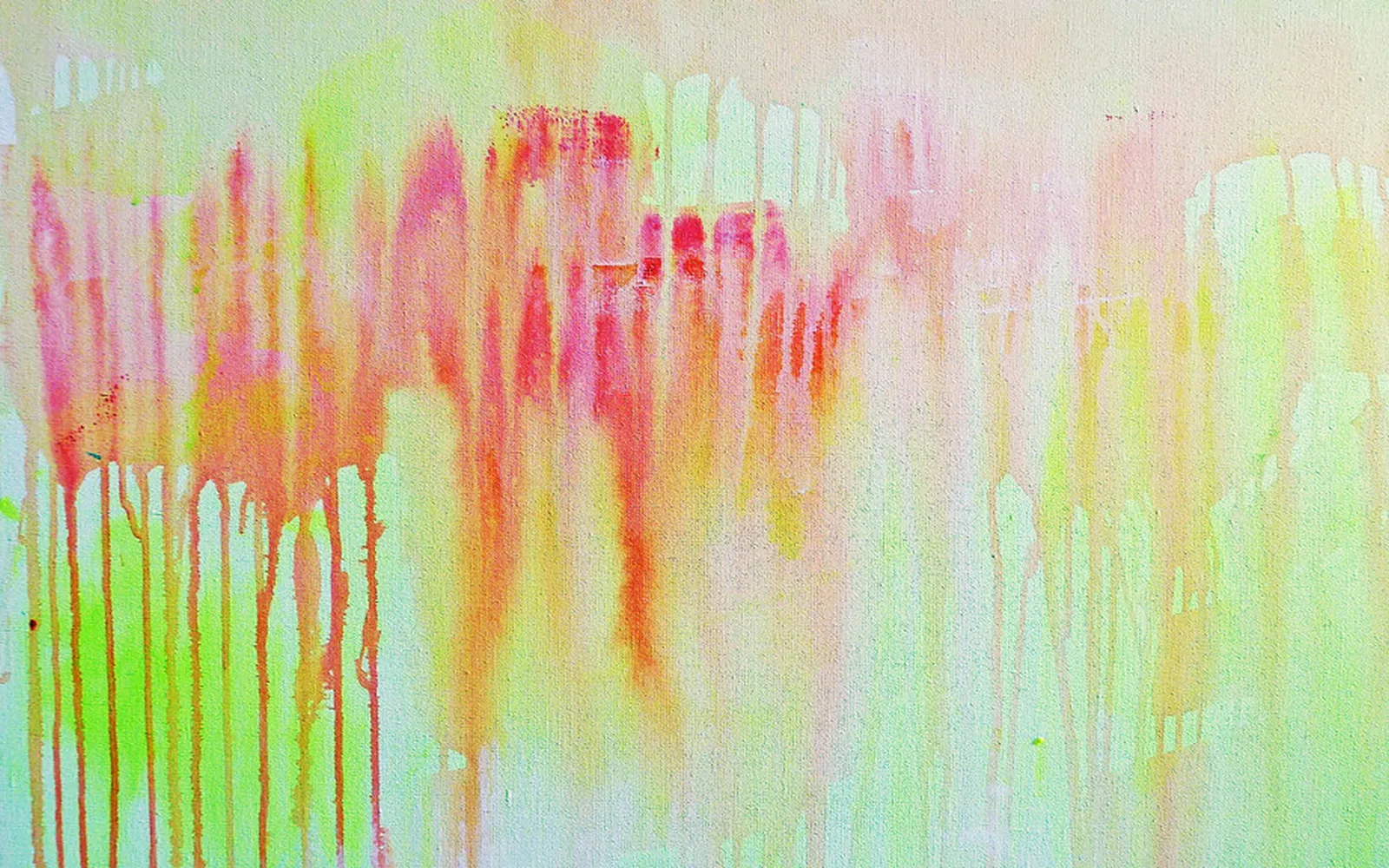 Canvas covered in pink, orange and lime-green paint running downward in long vertical drips